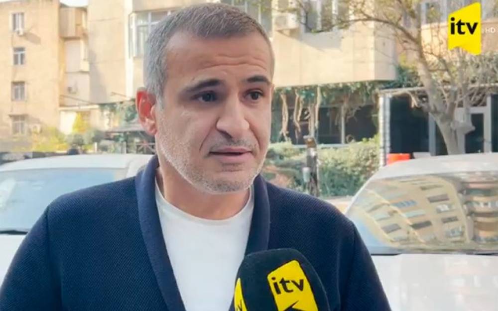 Yanan binadakı obyektin sahibi danışdı, sakinlər tərəfindən qovuldu - VİDEO